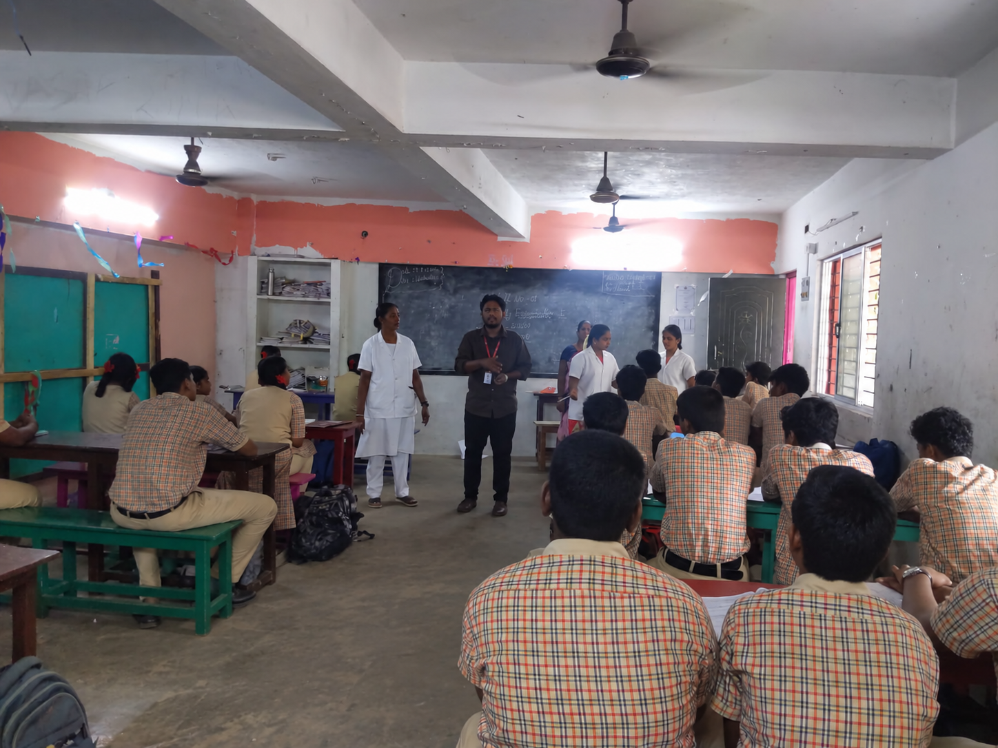 An awareness session with students and facilitators.